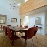 Gorgeous dining room with high ceilings and lots of natural light