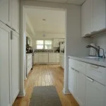 Butler's pantry leading into kitchen